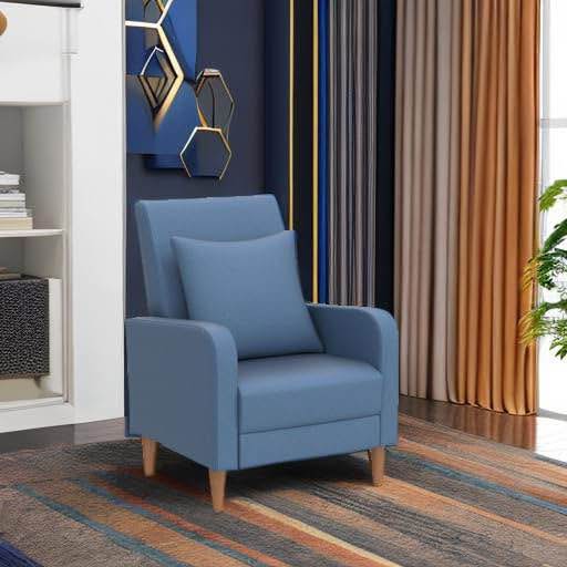 Brand new blue armchair with pillow