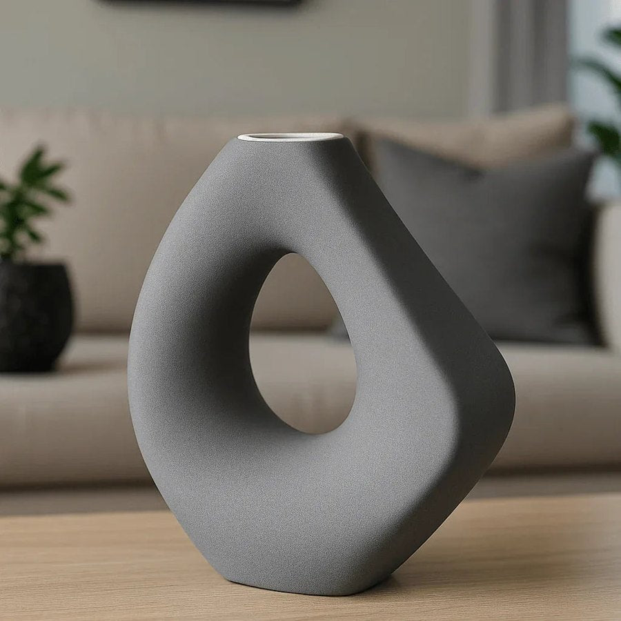 Grey sculptural decorative vase reference product photo