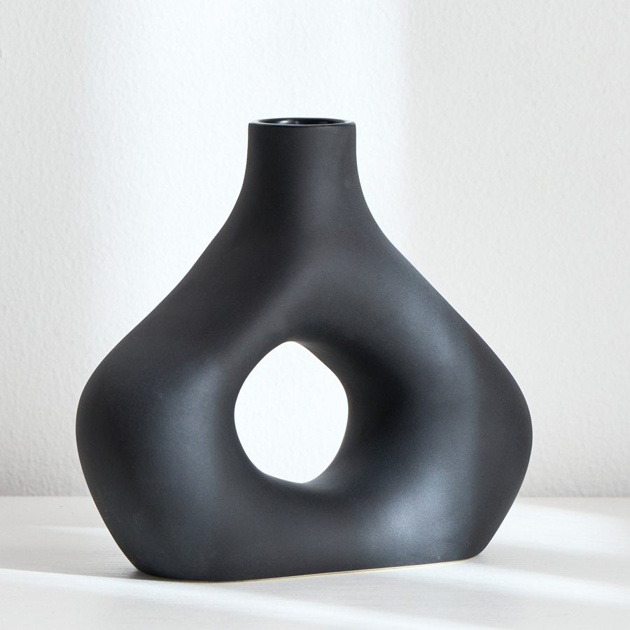 Black ceramic ring vase reference product photo